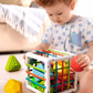 Cube éducatif avec blocs colorés et formes géométriques