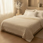 Gros plan sur texture douce de la couverture beige