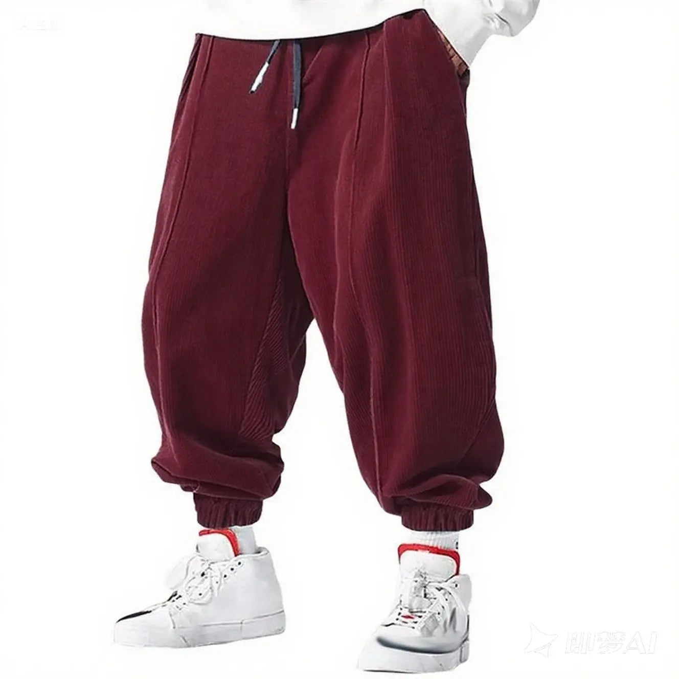 Détail du cordon de serrage sur un pantalon en velours