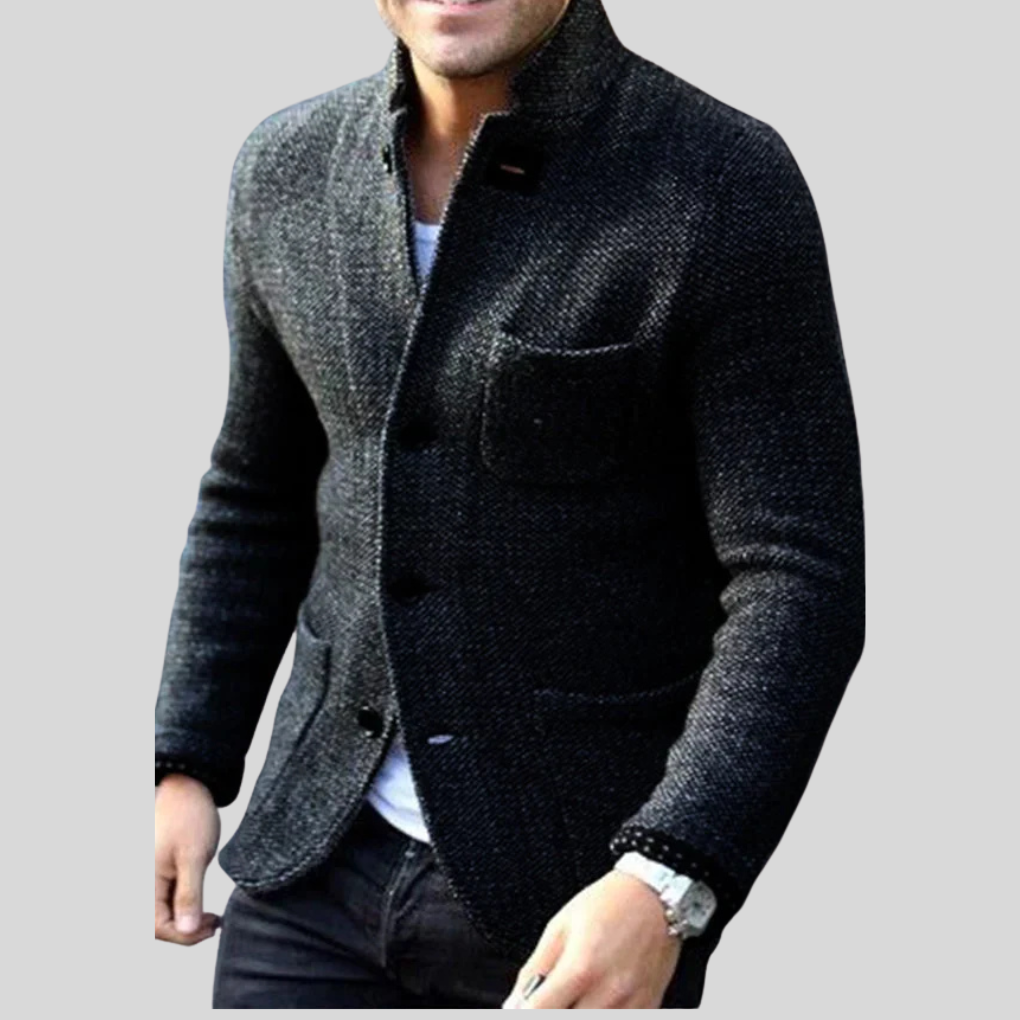 Blazer en laine avec col à revers et poches passepoilées