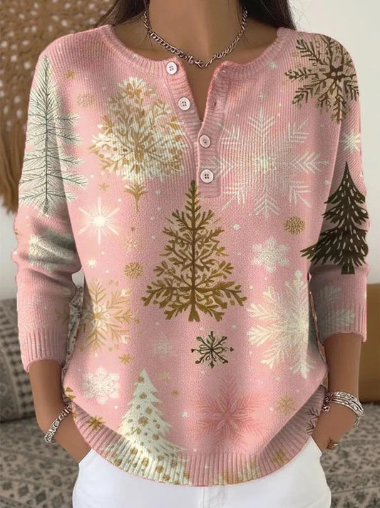 Gros plan sur le motif hivernal du pull, coupe flatteuse