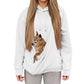 Hoodie avec poche pour animal, porté en extérieur