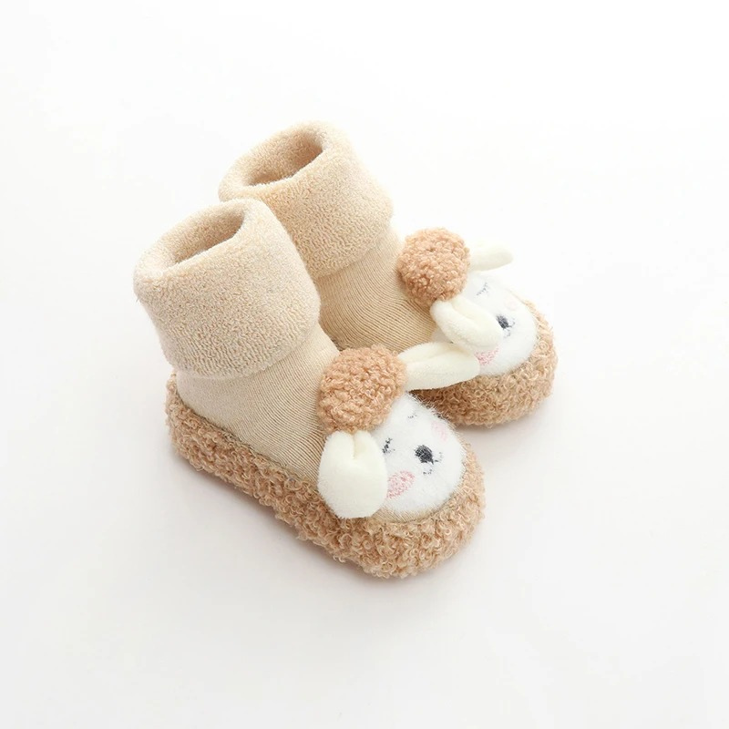 Semelle antidérapante des chaussures en peluche, vue de dessous