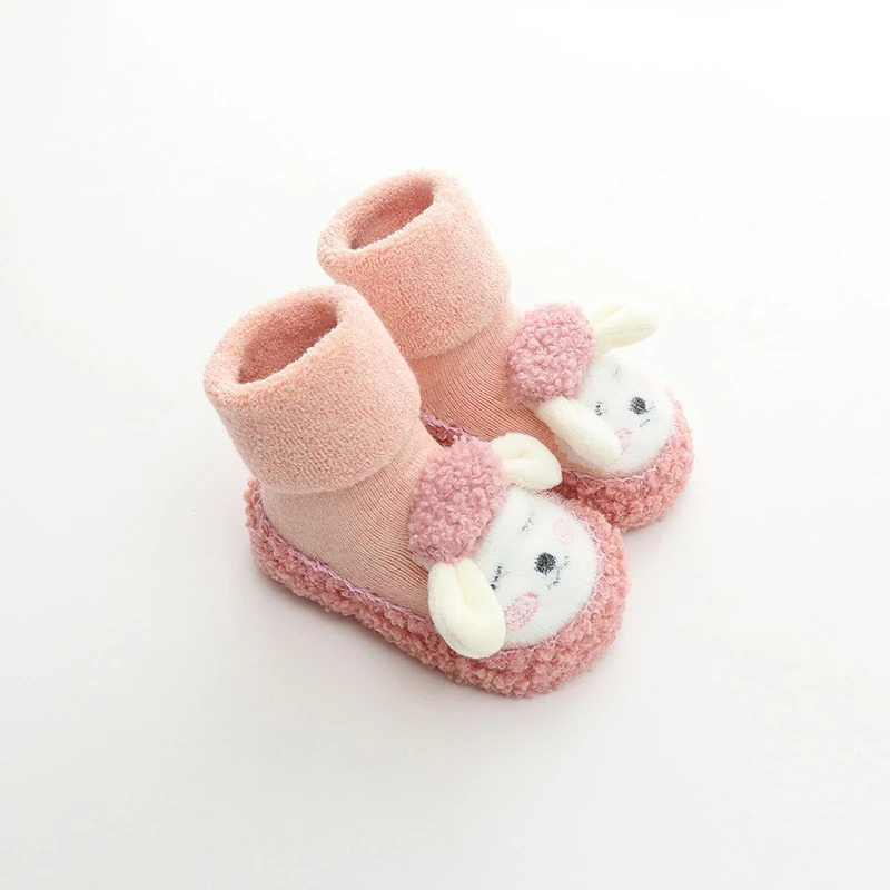 Chaussures roses en peluche avec tige haute ajustée