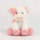 Peluche vache allongée, détails des pattes et du ventre