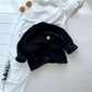Vue de dos d'une chemise femme en coton, manches longues