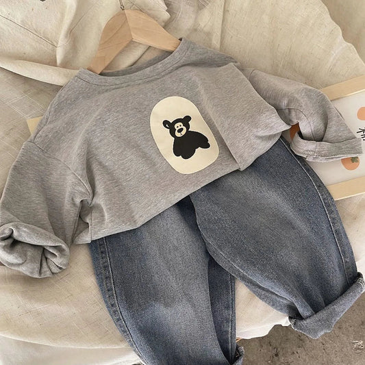 Gros plan sur la texture douce du pull en coton