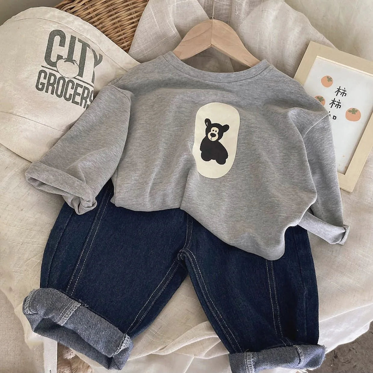 Vue de dos du pull mini avec motif ours