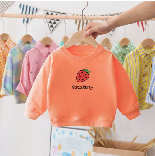 Texture du tissu en coton du pull fraise