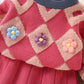 Vue de dos de l'ensemble tricoté, jupe et pull assortis