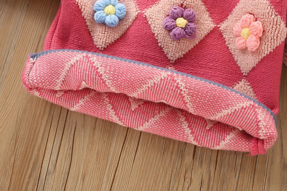 Zoom sur la jupe tricotée, texture et motif en gros plan