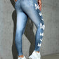 Vue arrière de jeggings noirs, ceinture haute visible