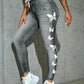 Zoom sur la couture et la texture des jeggings