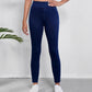Jeggings noirs taille haute en denim extensible, vue de face