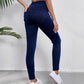 Jeggings noirs en denim extensible, vue arrière montrant les poches