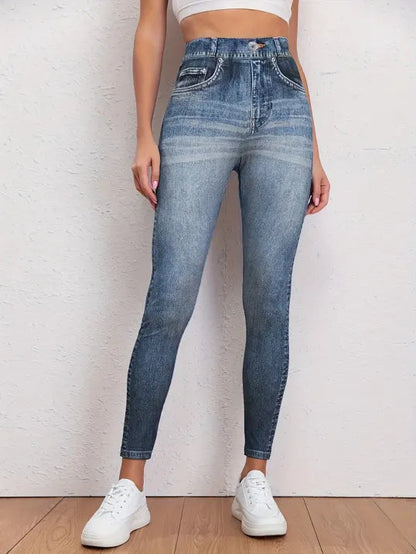 Jeggings noirs en denim extensible posés à plat