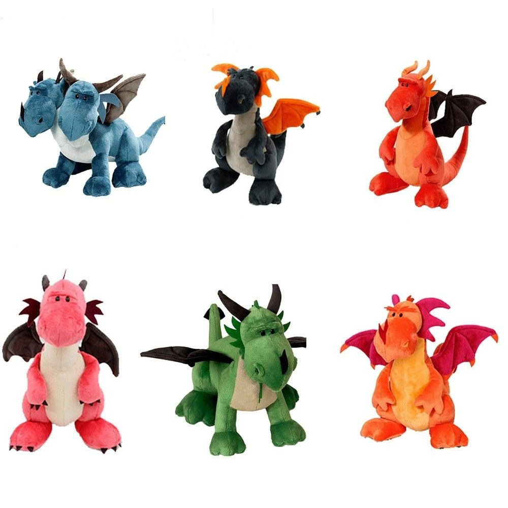 Peluche dragon vert avec ailes déployées sur fond blanc