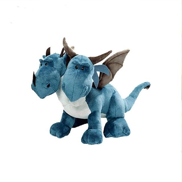 Gros plan sur la tête souriante d'un dragon en peluche