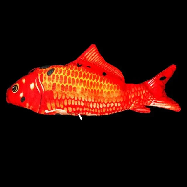 Jouet poisson en peluche entouré de décorations marines