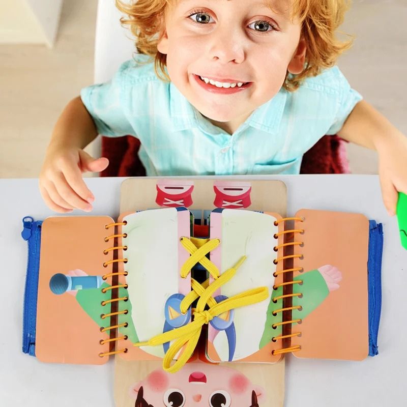 Planche d'activités avec boutons et fermetures éclair colorées