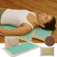 Tapis d'acupression vert avec picots blancs sur fond blanc