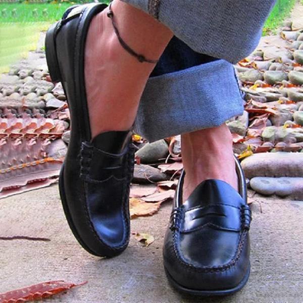 Vue arrière des mocassins, soulignant le talon renforcé