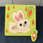 Puzzle éducatif en bois montrant différentes variétés de fruits