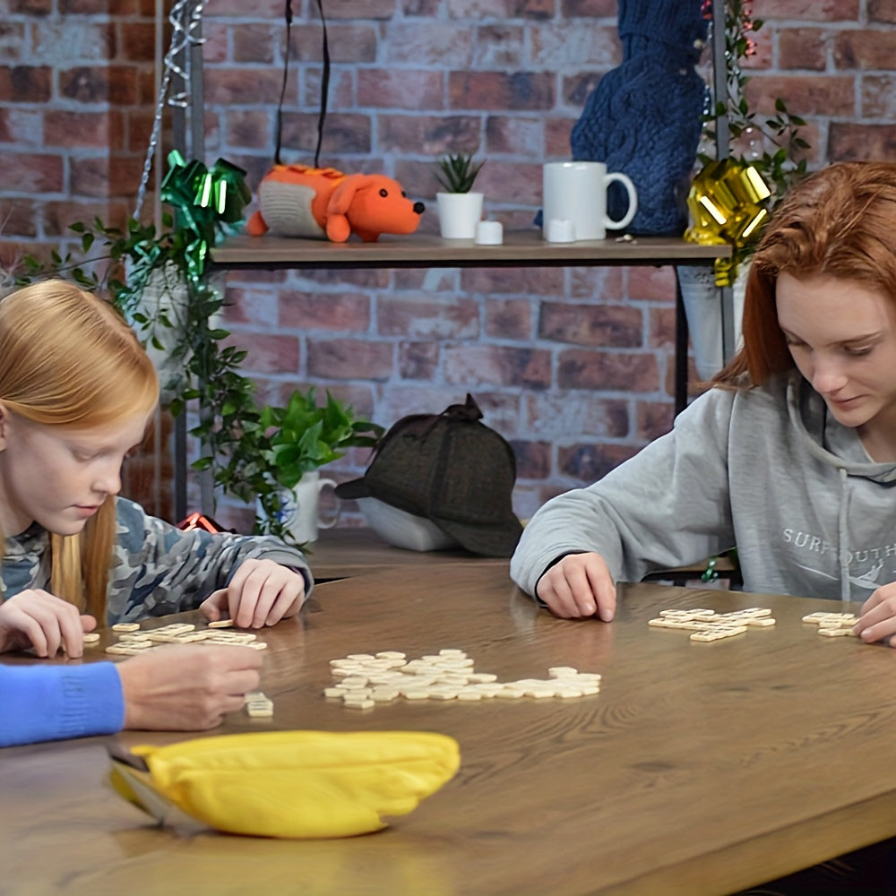 Enfants et adultes jouant ensemble autour d'une table avec le jeu