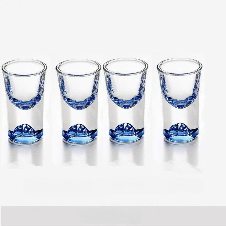 Verres à shot sur une table en bois