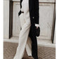 Manteau long en laine avec revers cranté et double boutonnage