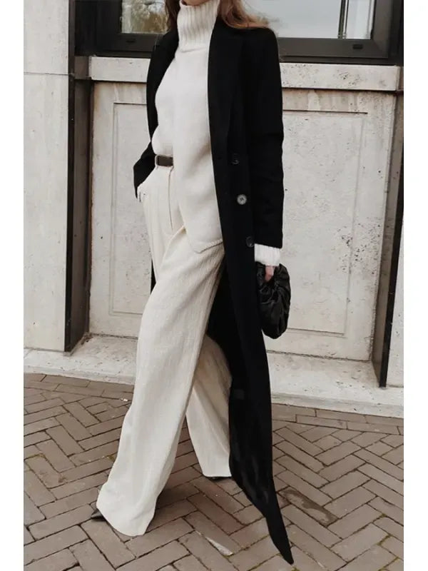 Manteau long en laine avec revers cranté et double boutonnage