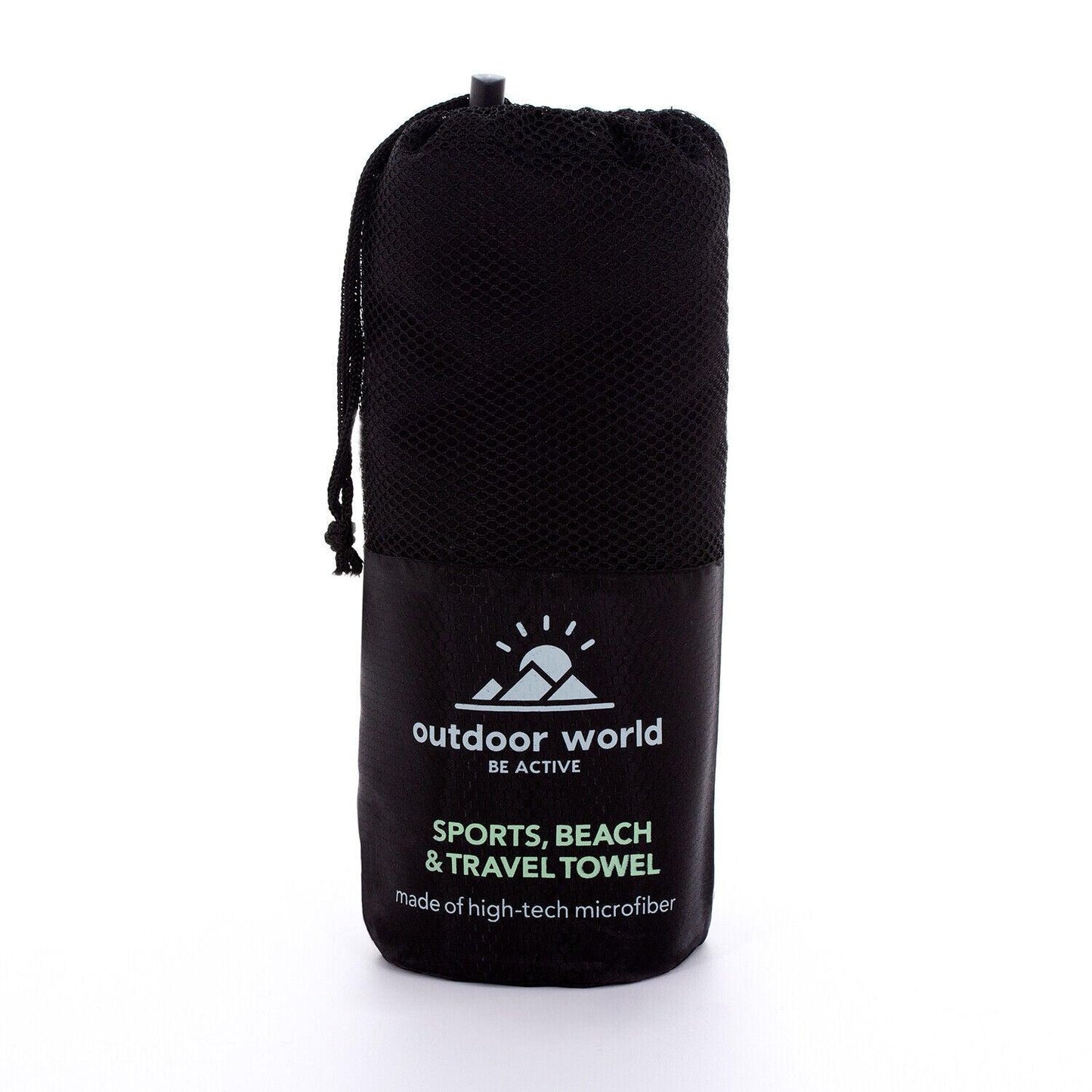 Serviette microfibre étalée sur herbe verte