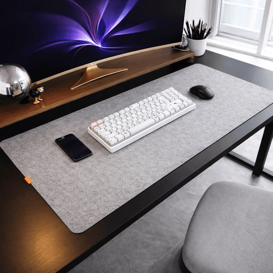 Tapis de bureau protégeant une surface en verre