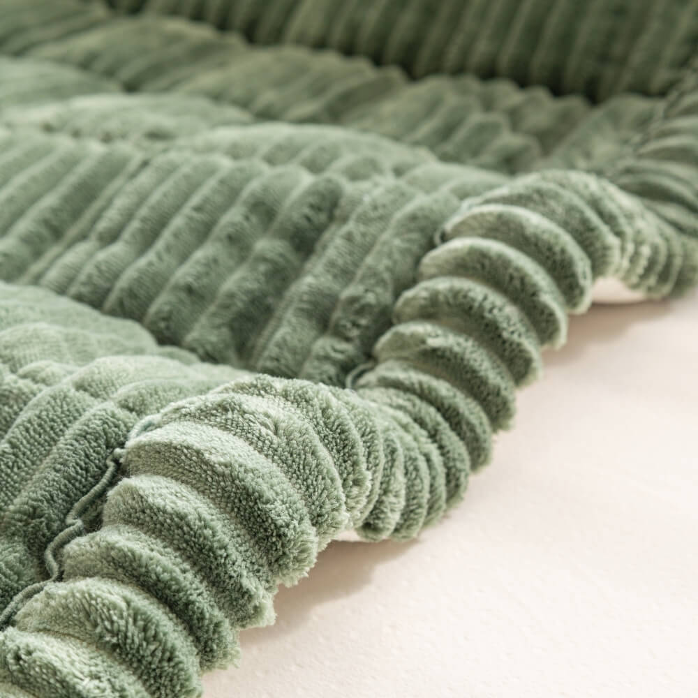 Tapis en flanelle plié, prêt à être rangé