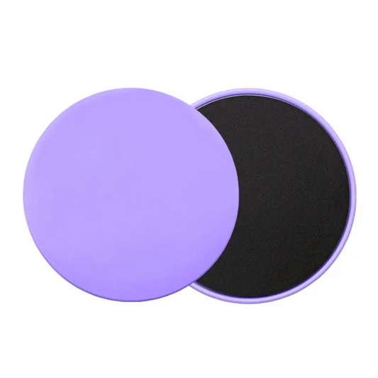 Disques de Pilates en différentes couleurs sur fond blanc