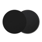 Disques de Pilates sur tapis de yoga gris