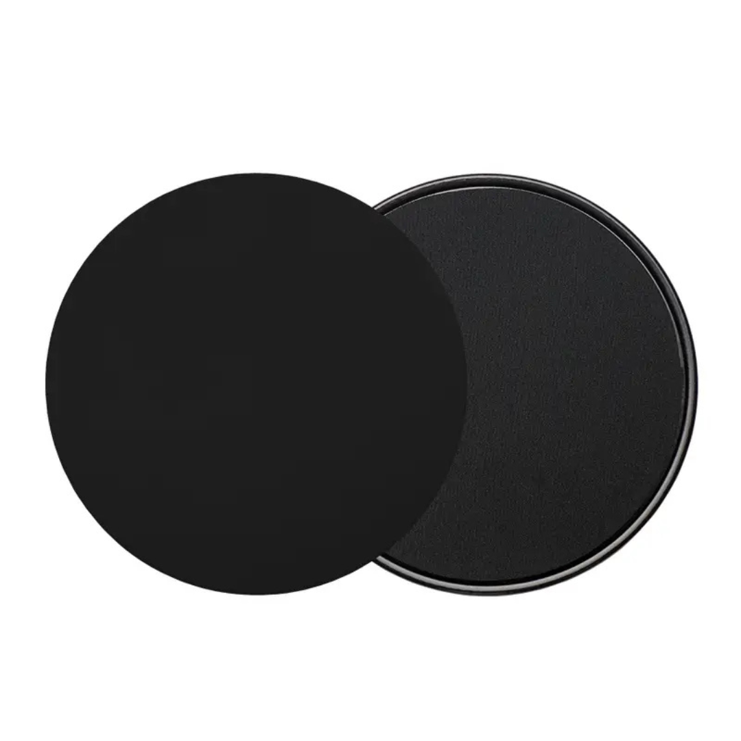 Disques de Pilates sur tapis de yoga gris
