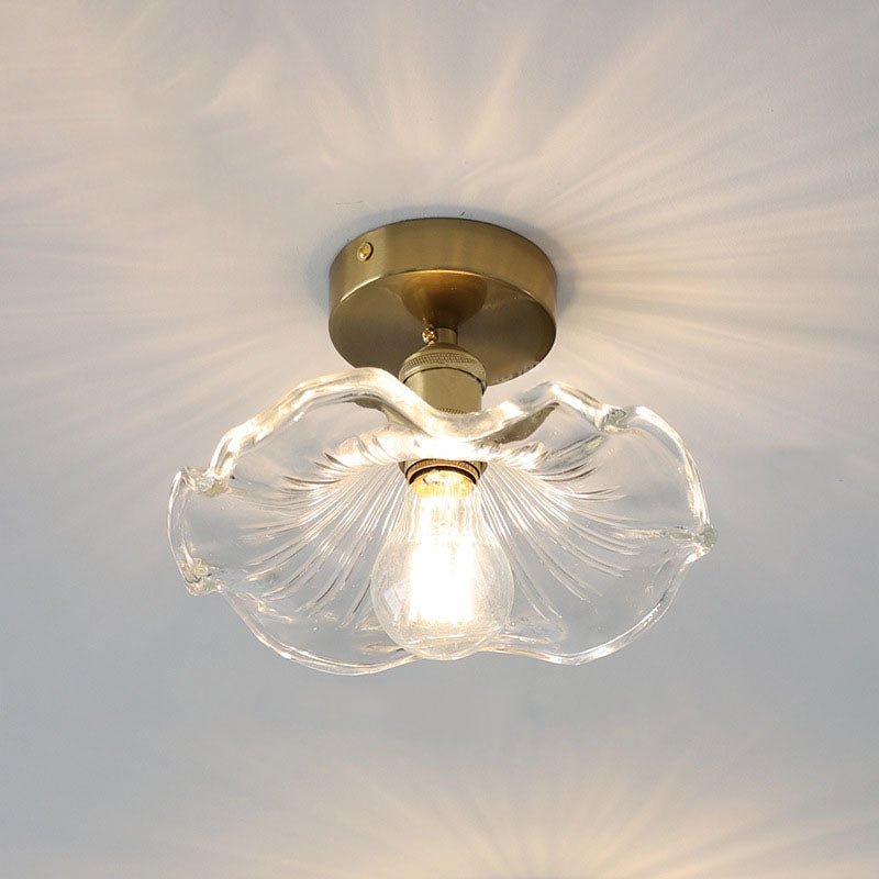 Lampe en verre et laiton vue de profil