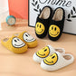 Chaussons d'hiver avec doublure en fausse fourrure et motif souriant