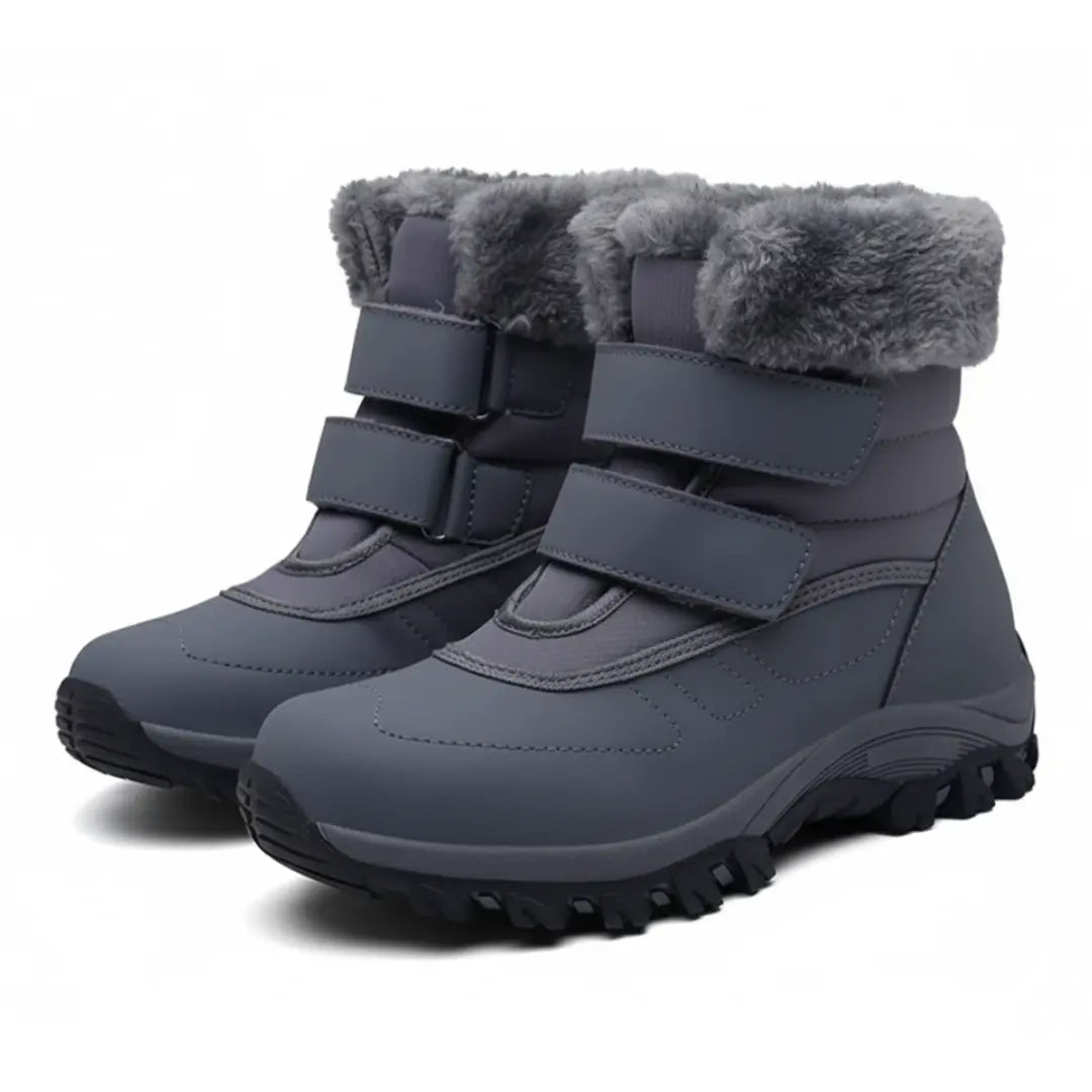 Bottines sur fond blanc, soulignant leur imperméabilité