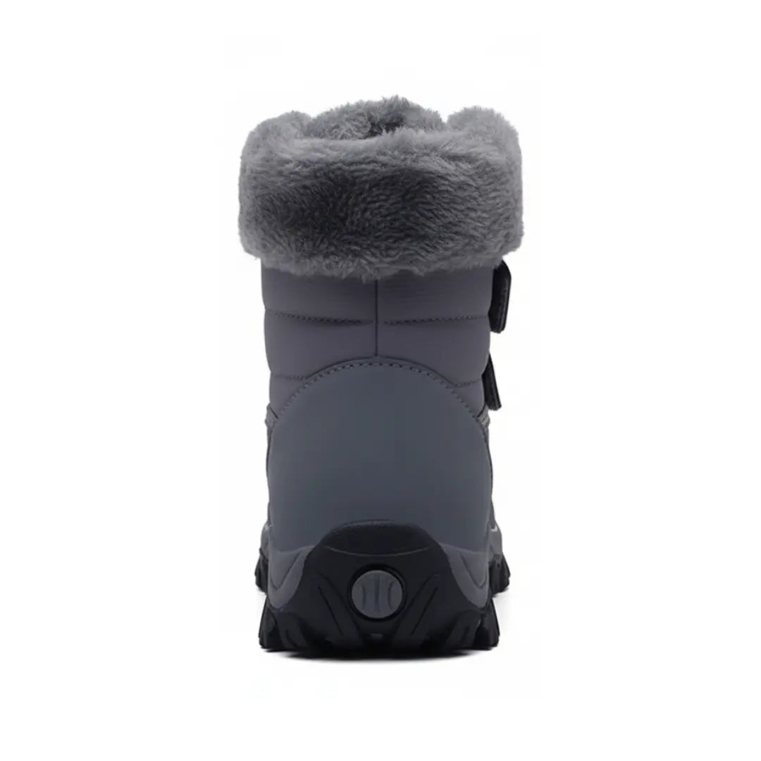 Vue latérale des bottines avec fermeture velcro et semelle robuste