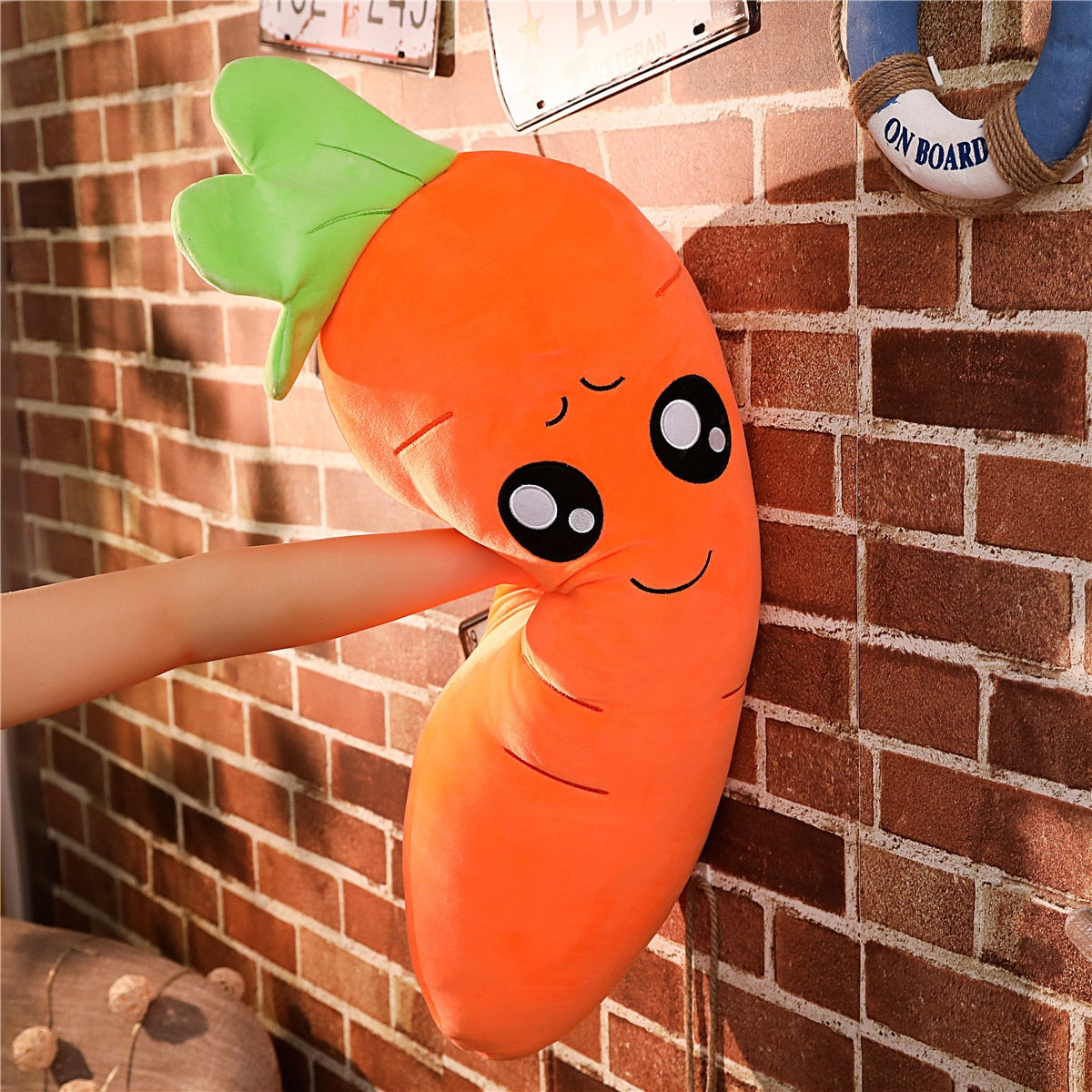 Collection de carottes en peluche, différentes tailles alignées