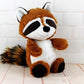 Vue latérale du raton laveur en peluche, doux et moelleux