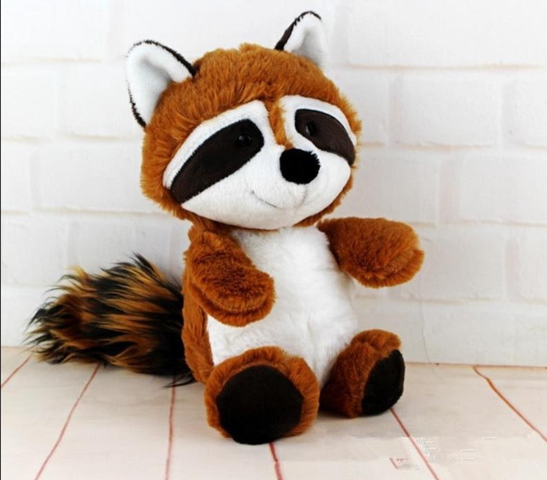 Vue latérale du raton laveur en peluche, doux et moelleux
