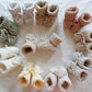 Chaussons bébé en tricot beige avec semelle en cuir