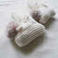Chaussons tricotés avec motif rayé pour bébé
