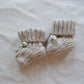 Chaussons en tricot pour bébé avec lacets décoratifs