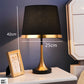 Lampe rétro dorée et noire, vue latérale complète