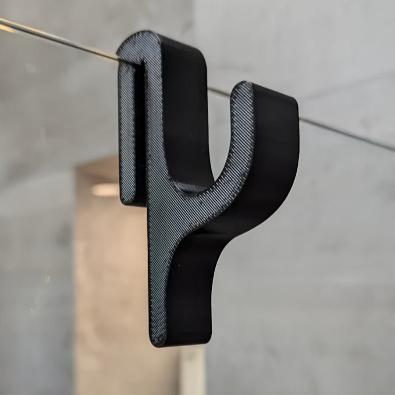 Crochet en verre noir avec peignoir accroché