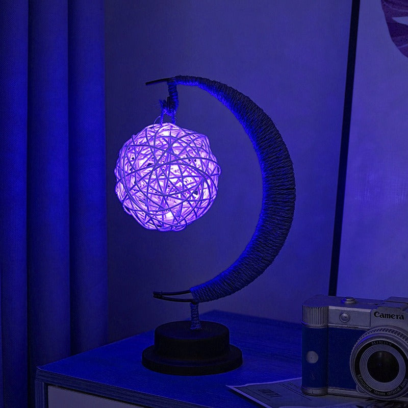 Lampe lunaire en verre avec interrupteur visible en bas